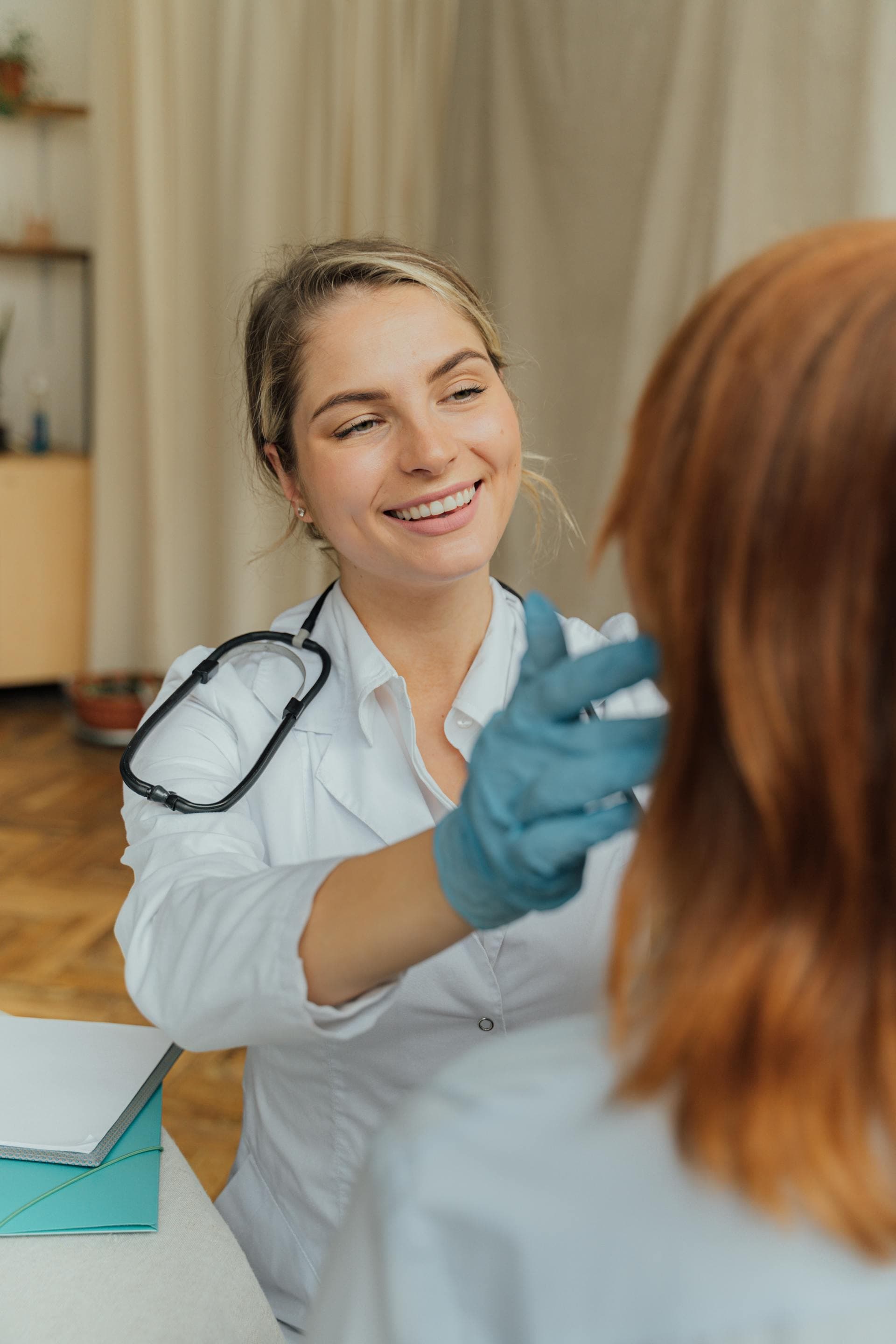 Clinician examining a patient